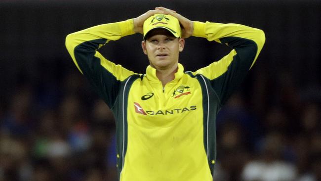 Australia cricket captain Steven Smith reacts during the defeat to India in the third ODI in Indore.