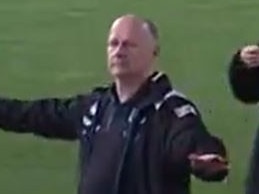 Ken Hinkley gestures to Jack Ginnivan that he won't be on a flight over this Insta reply "see u in 14 days'