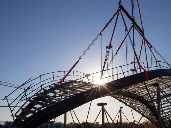 The canopy of a Metro station in craned into place.