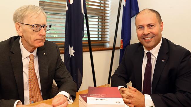 Commissioner Kenneth Hayne and Treasurer Josh Frydenberg with the final report from the Royal Commission into Misconduct in the Banking, Superannuation and Financial Services Industry, at Parliament House in Canberra. Picture: Kym Smith