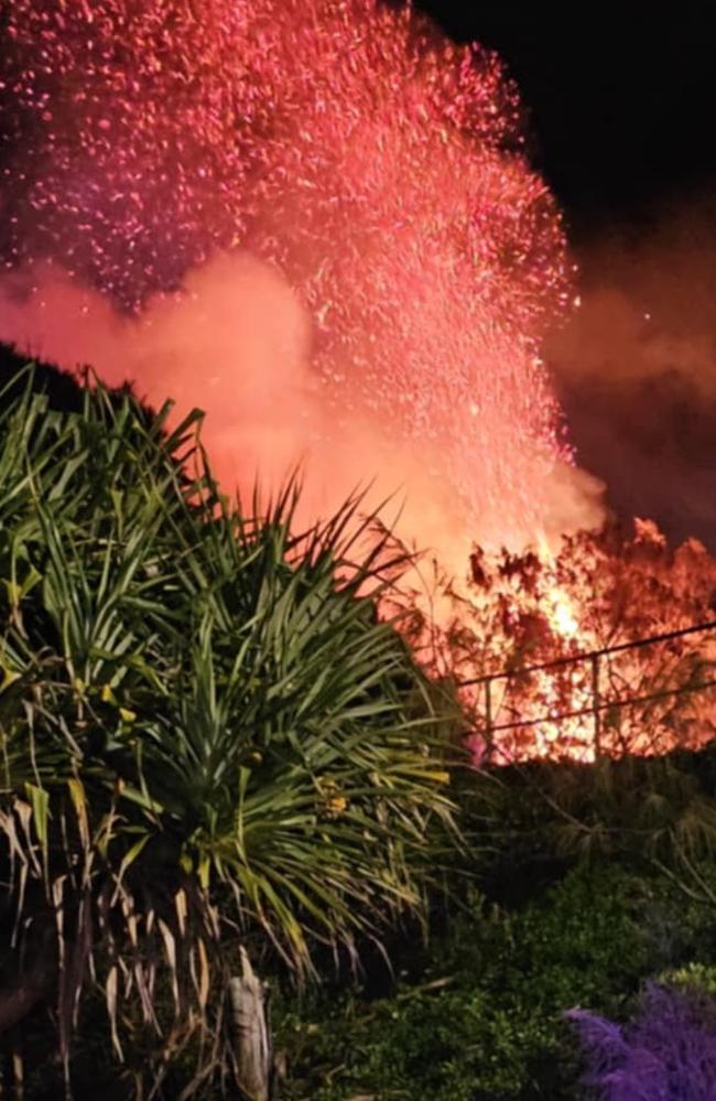 Fire roars behind the Nambucca Heads SLSC clubhouse about 8pm on Monday, October 7.