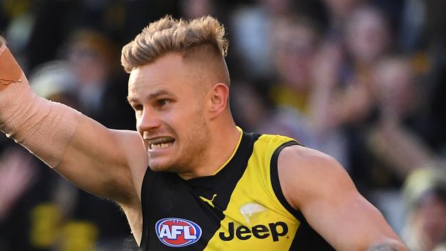 Brandon Ellis of the Tigers reacts after kicking a goal during the Round 18 AFL match between the Richmond Tigers and the Port Adelaide Power at the MCG in Melbourne, Saturday, July 20, 2019. (AAP Image/Julian Smith) NO ARCHIVING, EDITORIAL USE ONLY