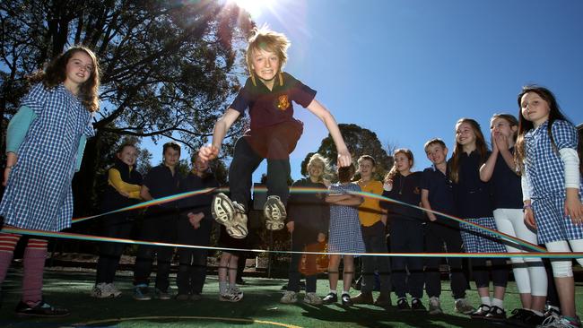 Redhill Primary jumping over elastics.