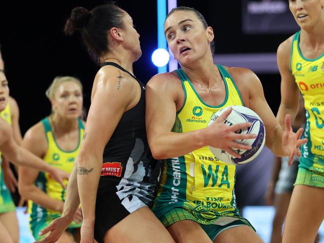 AUCKLAND, NEW ZEALAND - OCTOBER 23: Liz Watson of Australia  looks to pass (C) during game four of the 2023 Constellation Cup series between New Zealand Silver Ferns and Australia Diamonds at Spark Arena on October 23, 2023 in Auckland, New Zealand. (Photo by Fiona Goodall/Getty Images)