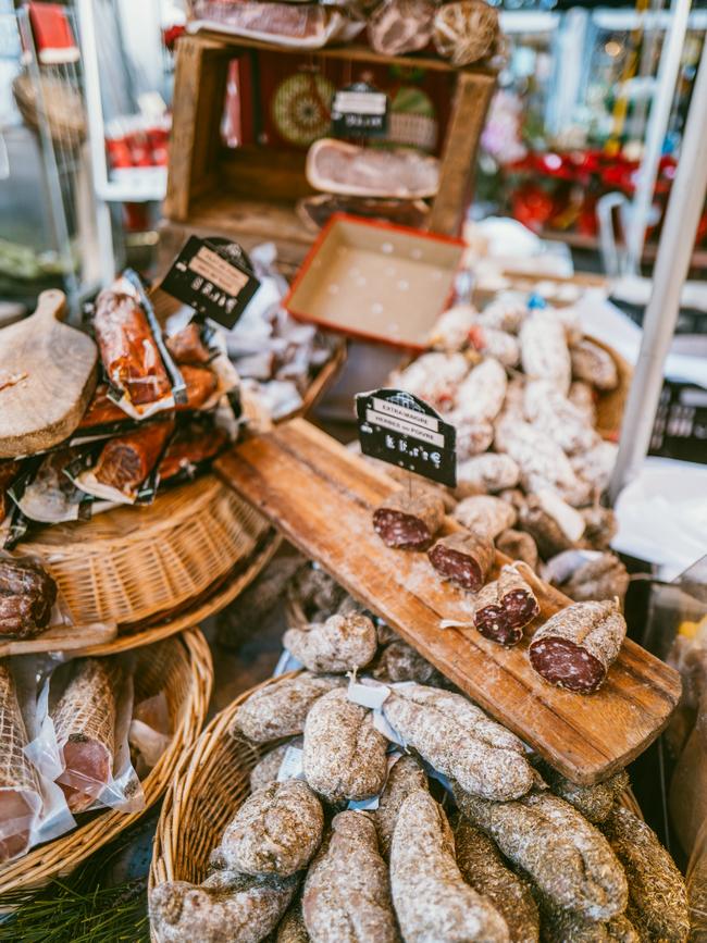 Local sausages and truffles for sale in France.