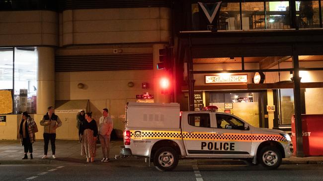 Police are seen along North Terrace at night, Adelaide last week. Picture: Morgan Sette)