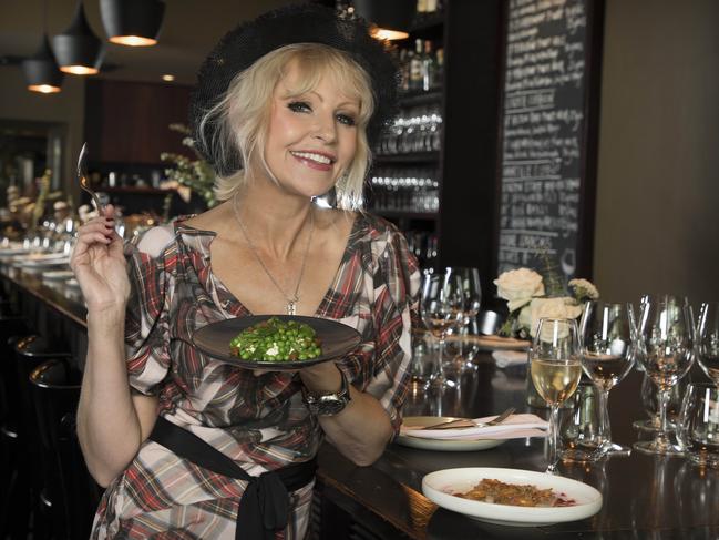 Nerida is the queen of racing fashions having a drink and eating at Bibo WIne Bar. It is a wine bar so a tick dark.  Photo by Chris Pavlich for News Corp.