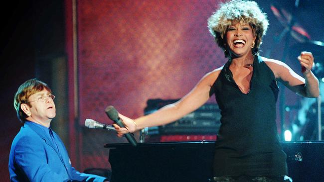 Tina Turner and Elton John perform at the VH1 Fashion and Music Awards in 1995.