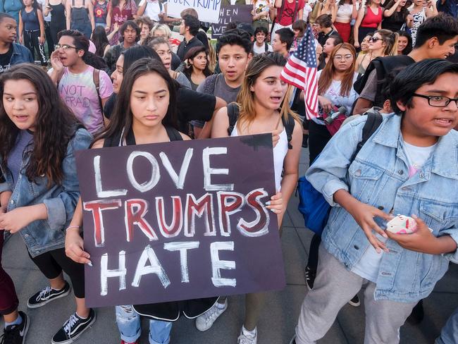 Demonstrators rally outside Los Angeles City Hall to protest the presidential election win President-elect Donald Trump in Los Angeles, California, on November 9, 2016. Picture: AFP