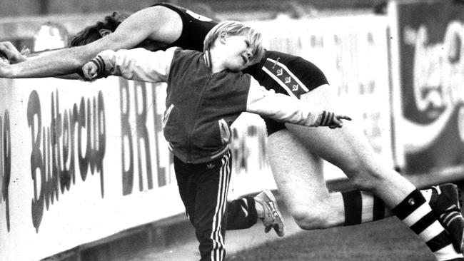 Nathan Ablett exercises with Damian Bourke at Geelong training in 1991. He and older brother Gary Jr would often head to training with their dad, Gary Sr.