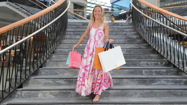 Rhiann Mulquiney from Broadbeach gets some shopping done at Pacific Fair. Picture: Glenn Hampson.