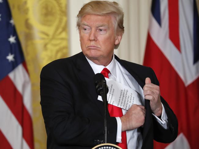 Donald Trump signed an executive order to suspend refugee arrivals and impose tough controls on travellers from Iran, Iraq, Libya, Somalia, Sudan, Syria and Yemen Picture: AP