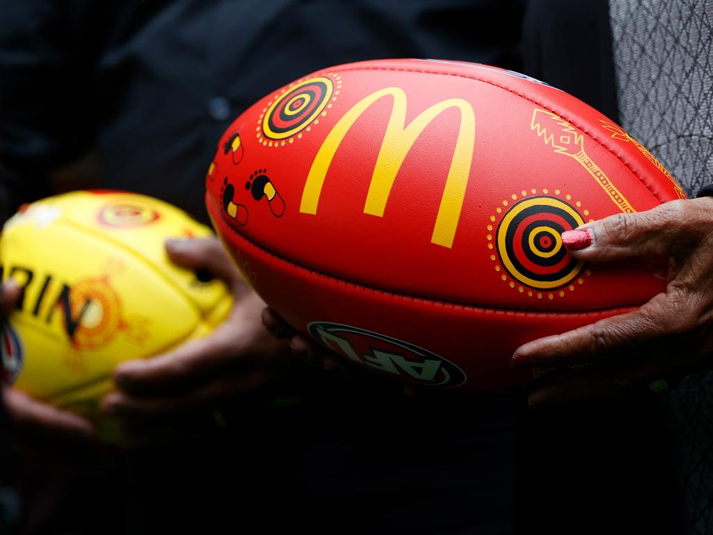 MELBOURNE, AUSTRALIA - MAY 16: The Indigenous Round Sherrin footballs are seen during the 2022 Sir Doug Nicholls Round Launch at the Melbourne Cricket Ground on May 16, 2022 in Melbourne, Australia. (Photo by Michael Willson/AFL Photos via Getty Images)