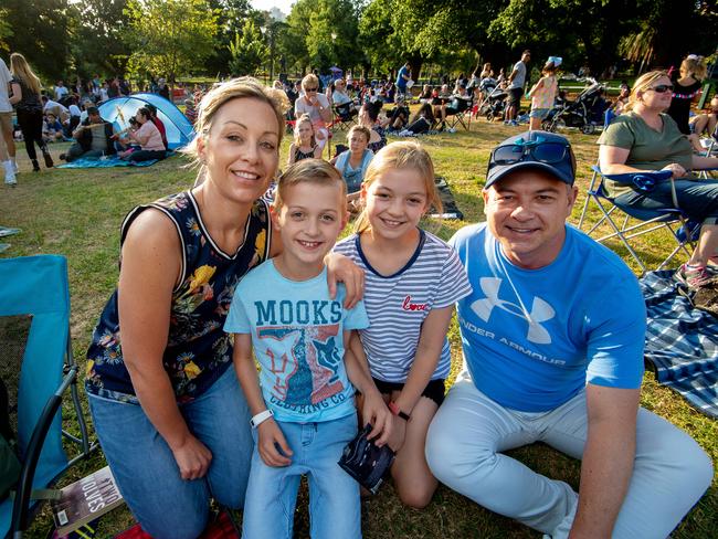 Justin and Fleur Peat with their kids Tamsin, 11, and Riley, 8, at Yarra Park. Picture: Jay Town