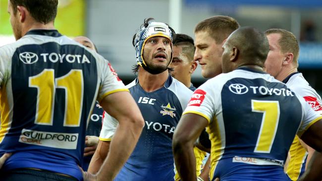 Cowboys skipper Johnathan Thurston looks on.