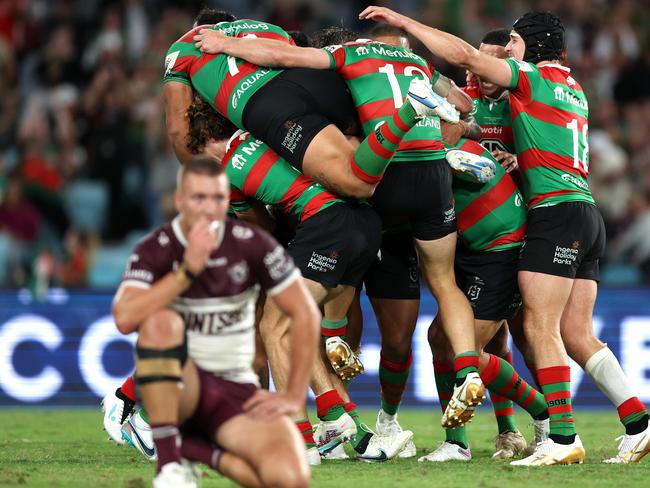 SYDNEY, AUSTRALIA - MARCH 25:  Lachlan Ilias of the Rabbitohs  celebrates with team mates after kicking a field goal in golden point time to win the round four NRL match between South Sydney Rabbitohs and Manly Sea Eagles at Accor Stadium on March 25, 2023 in Sydney, Australia. (Photo by Mark Metcalfe/Getty Images)