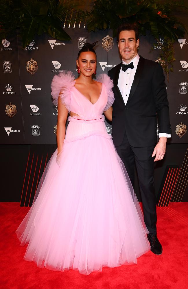 Jeremy Cameron and partner Indiana Putra, wearing a stunning pink gown.