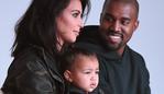 MUST CREDIT GETTY WEB RIGHTS ONLY NEW YORK, NY - FEBRUARY 12: Kim Kardashian, North West and Kanye West attend the adidas show during Mercedes-Benz Fashion Week Fall 2015 at Skylight Clarkson SQ. on February 12, 2015 in New York City. (Photo by Gary Gershoff/WireImage)