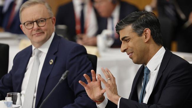 Anthony Albanese and Rishi Sunak take part in a working session during the G7 Leaders' Summit in Hiroshima.