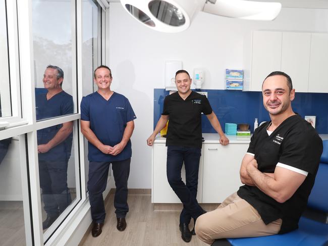 Dentists Andrew Sproll, Ned Restom and David Bassal have combined to form Central Coast Dental Emergency Services during the pandemic. Picture: Sue Graham