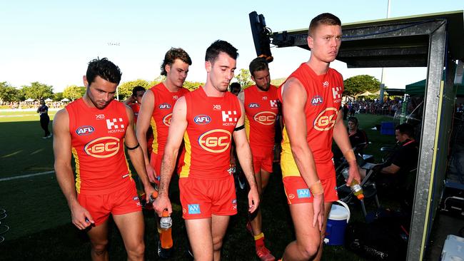 Gold Coast players after their loss to St Kilda on Saturday. Picture: AAP