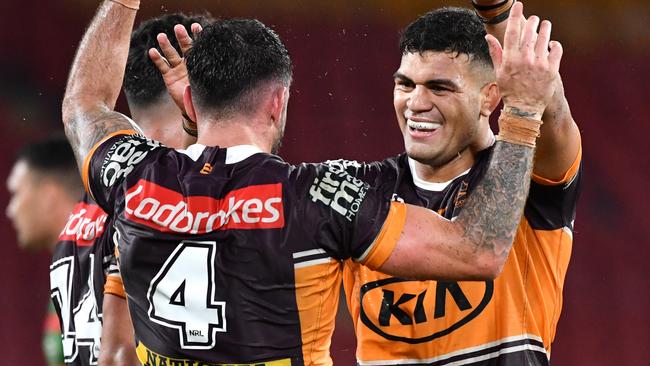 Darius Boyd (No.4) says David Fifita (right) needs to consider his happiness ahead of his bank balance. Picture: AAP Image/Darren England