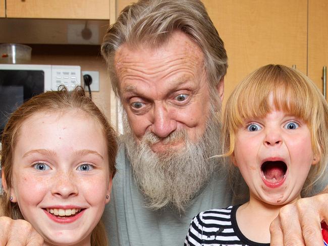 Pakenham grandfather Ian Rowed 71 sneaks junk food treats into the diet of his grandchildren, Savannah,11 and Sophia, 5. Picture: Mark Stewart