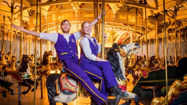 Luna Park ride operators Ola Koch and Greg Smith show off the carousel. Picture: Jake Nowakowski