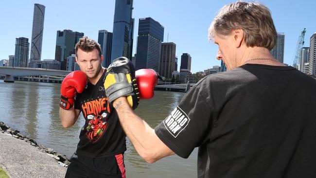 Jeff Horn at Brisbane’s South Bank with trainer Glenn Rushton. Picture: Annette Dew