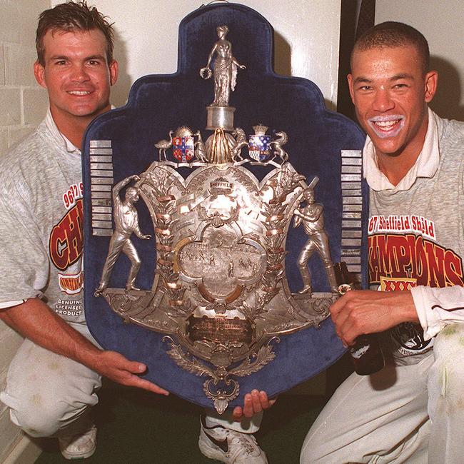 WA vs Qld cricket final at WACA, Matthew Mott and Andrew Symonds with the Sheffield Shield. trophy headshot