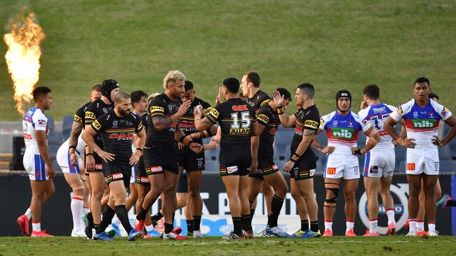 The Panthers celebrate their opening try by Viliame Kikau.