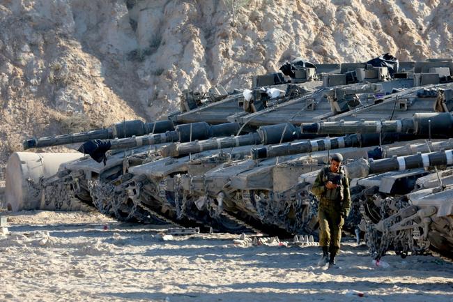 Israeli tanks take position on the Gaza border amid calls from a far-right minister to use 