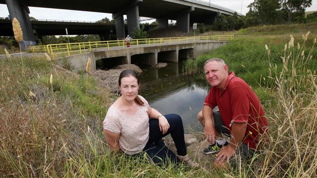 Friends of Moonee Ponds Creek members Jenica Brooke with Kevin Balaam are disappointed rubbish is ending up in local waterways. Picture Andrew Tauber