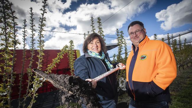 Huon Aquaculture's Frances Bender with cherry grower Nic Hansen. They have partnered up with Hansen Orchards taking Huon's salmon waste and transforming it into compost for their cherries. Picture: LUKE BOWDEN