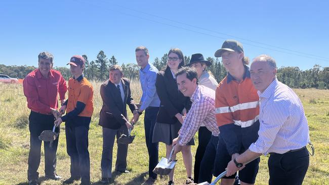 Premier Annastacia Palaszczuk with Maryborough MP Bruce Saunders, Transport Minister Mark Bailey, Hervey Bay MP Adrian Tantari and Fraser Coast Mayor George Seymour turn the sod at the site of the new $239 million Torbanlea train factory with the help of students from Maryborough State High School.