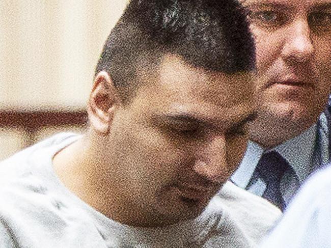 Accused Bourke Street driver Dimitrious Gargasoulas (centre) arrives at the Supreme Court of Victoria in Melbourne, Wednesday, June 13, 2018. Dimitrious Gargasoulas is facing an investigation hearing to decide whether he is mentally fit to stand trial over a Melbourne rampage that killed six people, including two children. (AAP Image/Daniel Pockett) NO ARCHIVING