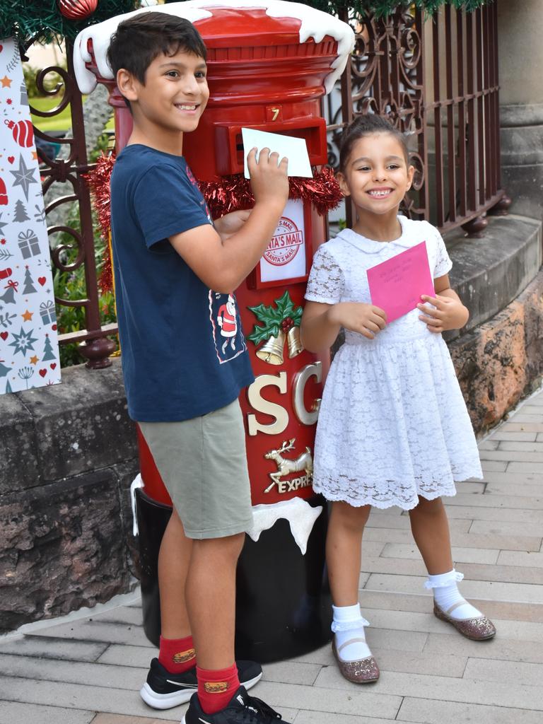 Ilia Taudros and Sasha Taudros at the CBD Christmas Fair in Rockhampton on December 3, 2022.