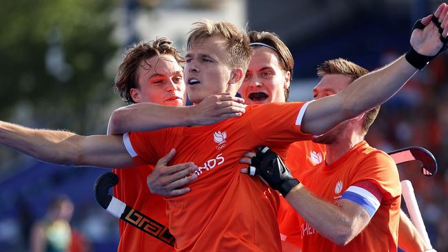 PARIS, FRANCE - AUGUST 04: Thijs van Dam of Team Netherlands celebrates scoring his team's second goal with teammates during the Men's Quarter Final match between Netherlands and Australia on day nine of the Olympic Games Paris 2024 at Stade Yves Du Manoir on August 04, 2024 in Paris, France. (Photo by Lars Baron/Getty Images)