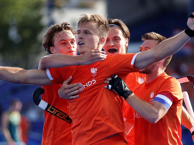 PARIS, FRANCE - AUGUST 04: Thijs van Dam of Team Netherlands celebrates scoring his team's second goal with teammates during the Men's Quarter Final match between Netherlands and Australia on day nine of the Olympic Games Paris 2024 at Stade Yves Du Manoir on August 04, 2024 in Paris, France. (Photo by Lars Baron/Getty Images)