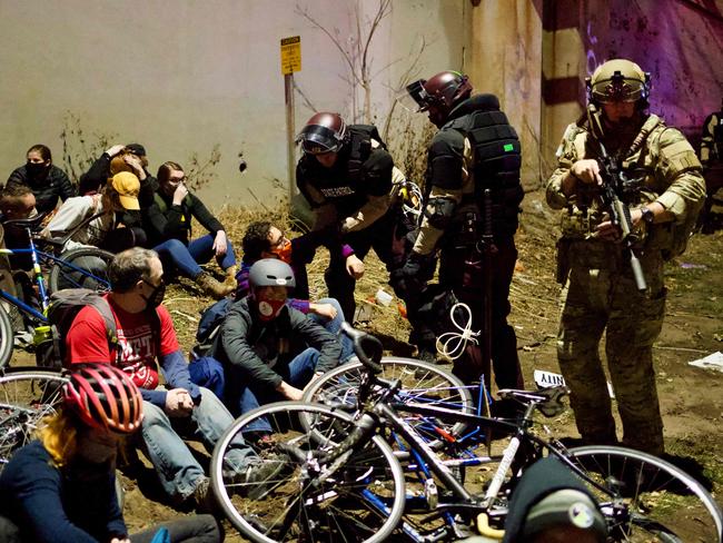 Minneapolis State Patrol arrest people protesting against racism and issues with the presidential election. Picture: AFP