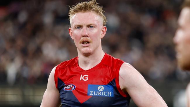 MELBOURNE, AUSTRALIA - SEPTEMBER 15: Clayton Oliver of the Demons looks dejected after a loss  during the 2023 AFL First Semi Final match between the Melbourne Demons and the Carlton Blues at Melbourne Cricket Ground on September 15, 2023 in Melbourne, Australia. (Photo by Dylan Burns/AFL Photos via Getty Images)