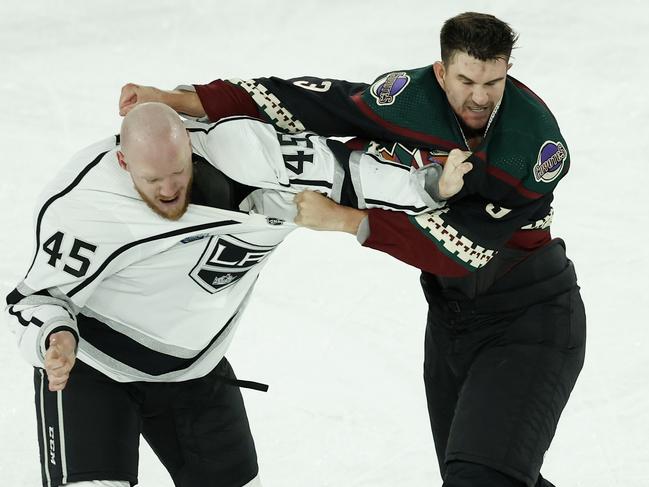 MELBOURNE, AUSTRALIA - SEPTEMBER 23: Jacob Doty of the LA Kings fighs with Josh Brown of the Arizona Coyotes during the NHL Global Series match between Arizona Coyotes and Los Angeles Kings at Rod Laver Arena on September 23, 2023 in Melbourne, Australia. (Photo by Darrian Traynor/Getty Images)