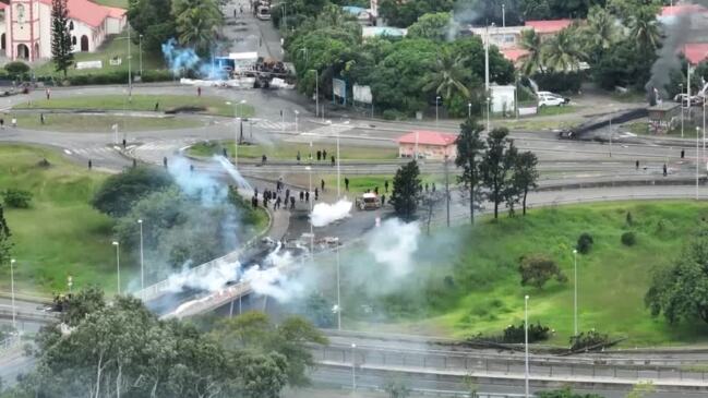 Drone footage shows clashes, fires burning in New Caledonia