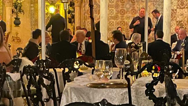 Donald Trump, his advisor Taylor Budowich, Tim Cook and Elon Musk at Mar-a-Lago. Picture: John Stensholt