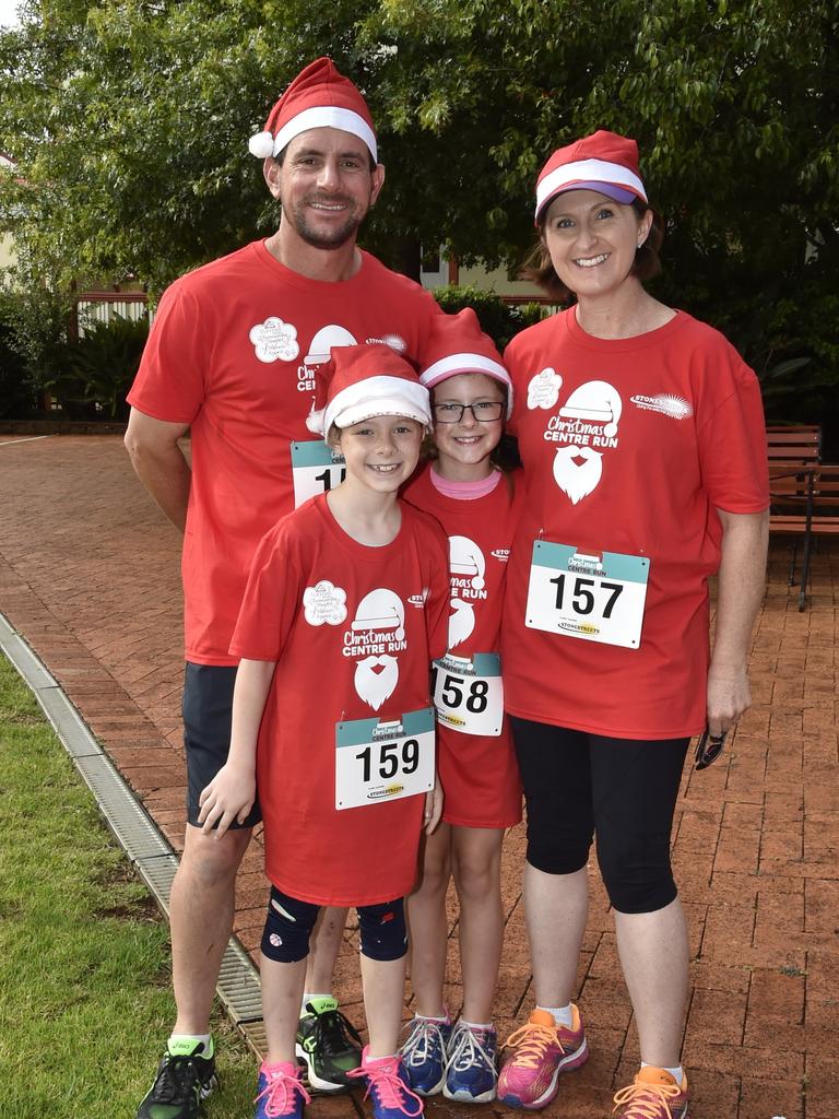 Running together, sisters Meg and Kate with parents Kris and Jane Roper. Toowoomba Hospital Foundation, Christmas centre run. December 2017