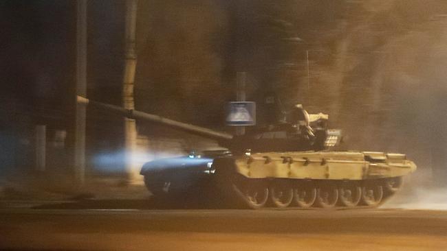 A tank drives along a street in the separatist-controlled city of Donetsk, Ukraine, overnight. Picture: REUTERS/Alexander Ermochenko