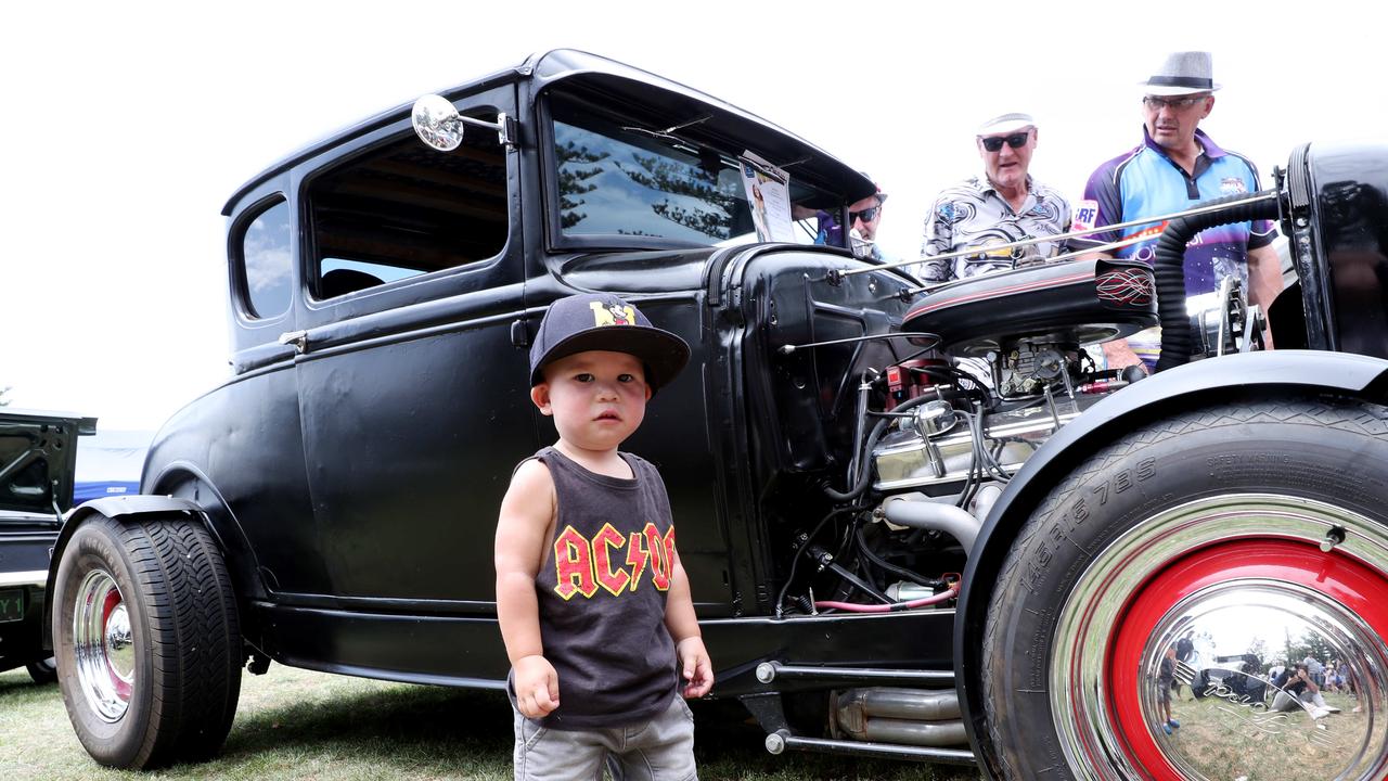 Hendrix Aribowo, 20 months, at in front of a car at CromeFest. Picture: Sue Graham