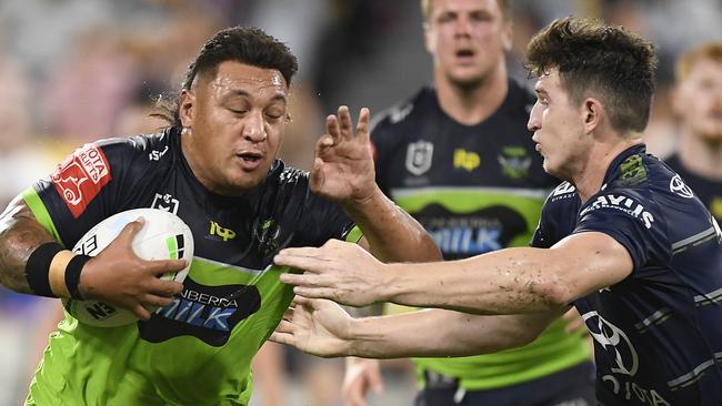 TOWNSVILLE, AUSTRALIA - APRIL 24:  Josh Papalii of the Raiders is tackled by Ben Condon of the Cowboys  during the round seven NRL match between the North Queensland Cowboys and the Canberra Raiders at QCB Stadium, on April 24, 2021, in Townsville, Australia. (Photo by Ian Hitchcock/Getty Images)