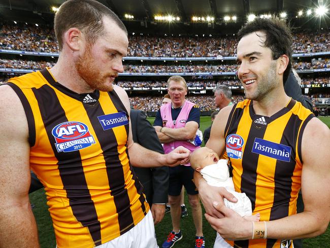 Jordan Roughead and Jordan Lewis following the 2015 AFL Grand Final.
