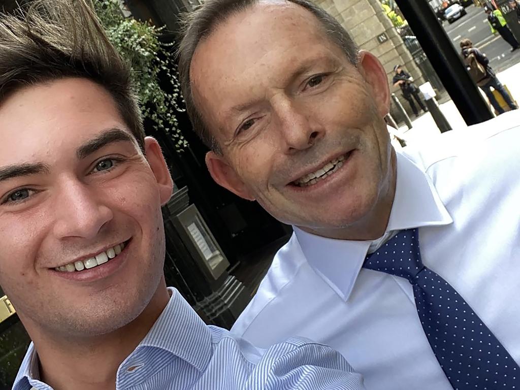 Tom Harwood, senior reporter at Guido Fawkes, takes a selfie with former Australian Prime Minister Tony Abbott outside the Red Lion Pub on Whitehall in Westminster. Picture: Twitter / @tomhfh